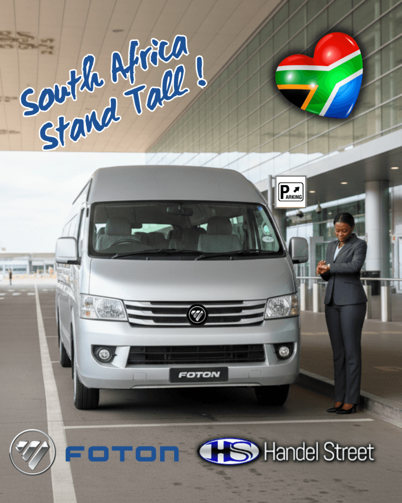 A professional fleet owner in a suit standing by a Foton View Luxury Shuttlebus at a premium airport terminal.